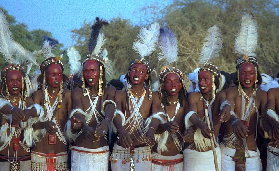 Wodaabe contestants singing and dancing at Gerewol in Niger in 1997. Wodaabe traditions form one part of the wider Fulani cultural world.
