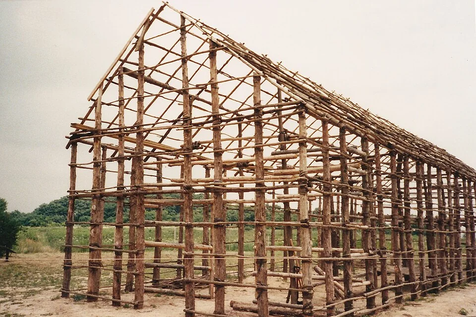 A reconstructed Seneca longhouse under construction at Ganondagan, New York, in 1997.