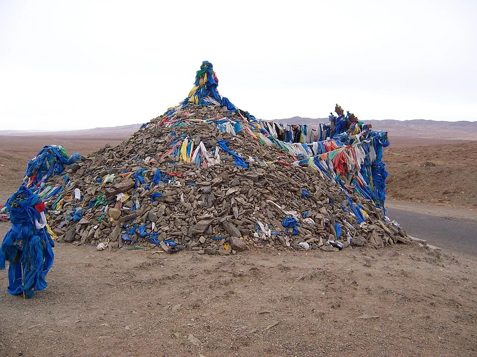 An ovoo, a ritual cairn in the Mongolian landscape.