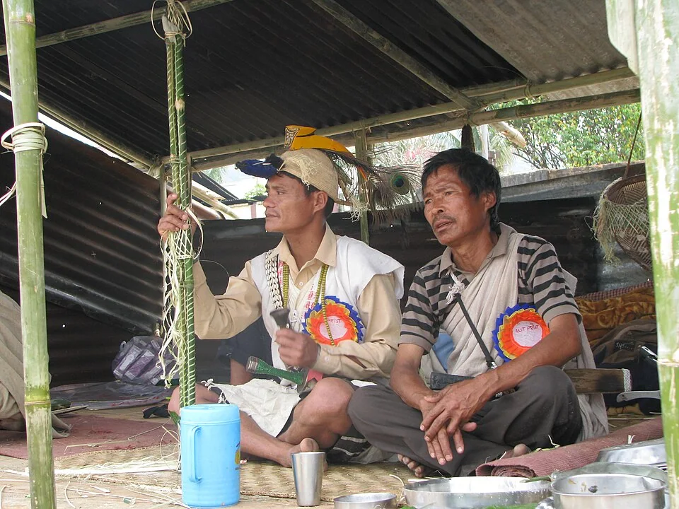 A priest conducting Nyokum puja in Arunachal Pradesh, India.