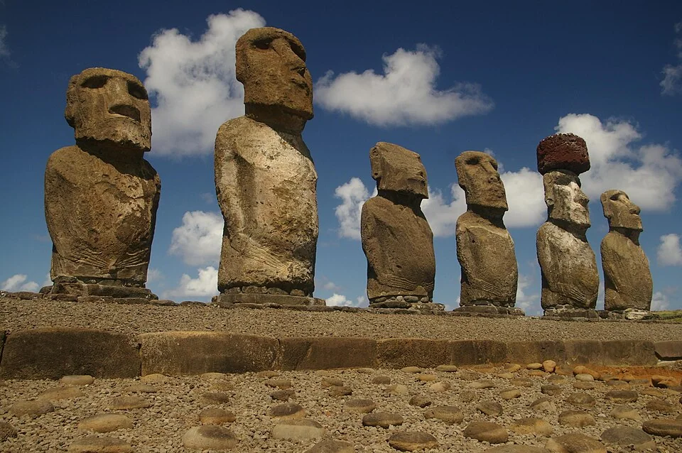 Moai standing on the restored ceremonial platform at Ahu Tongariki, Rapa Nui.