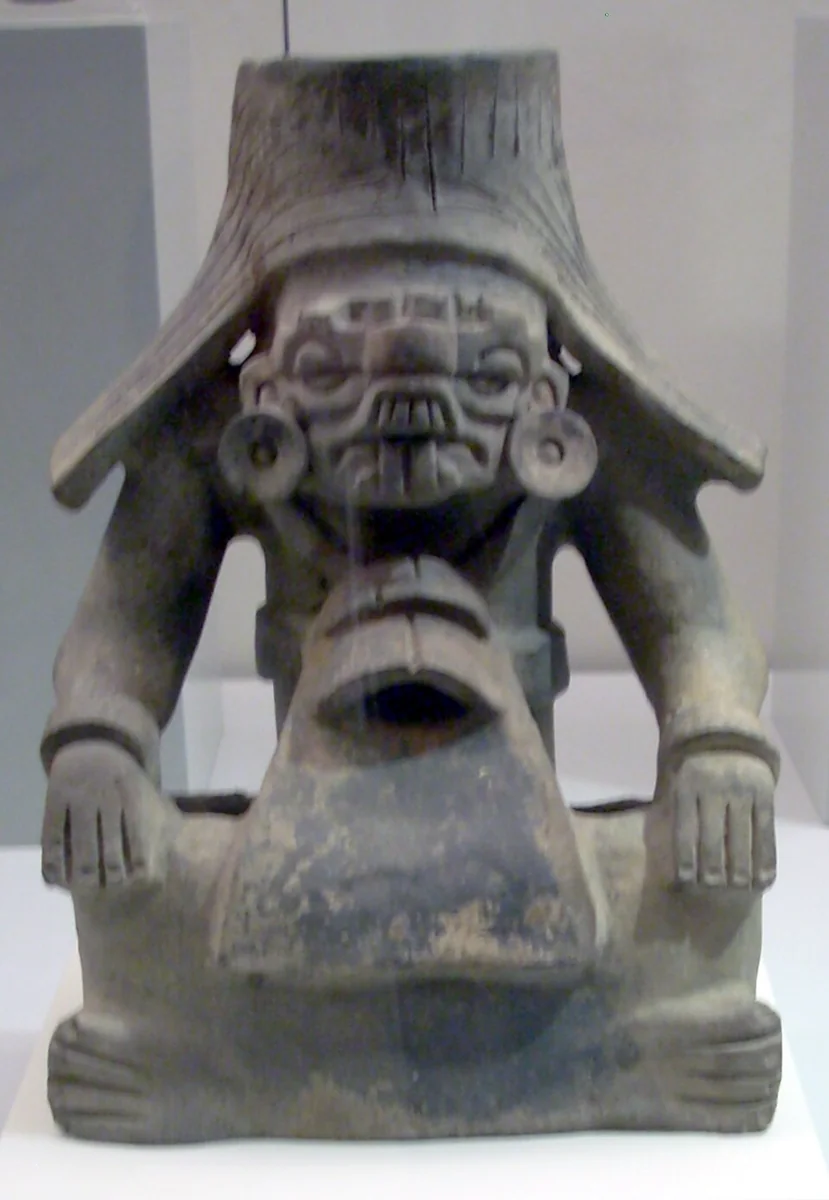 A Classic-period Zapotec urn representing Cocijo, in the Museo de América, Madrid.